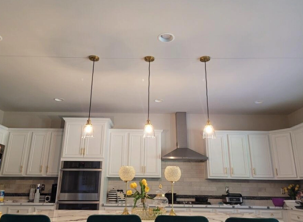 hanging lamps installed in a renovated kitchen